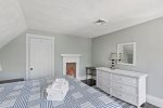 large king bedroom with dresser and closet